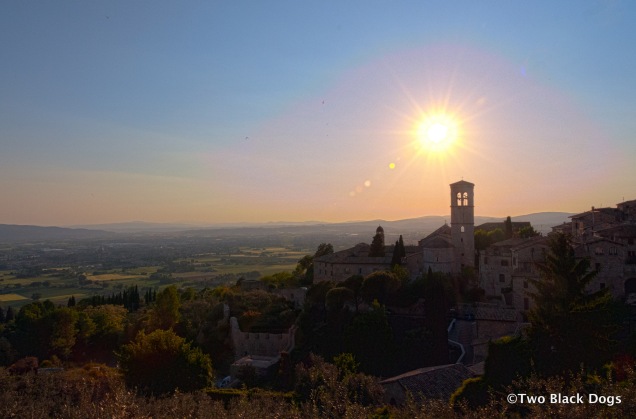 Sun sets on the town of Assisi, Italy
